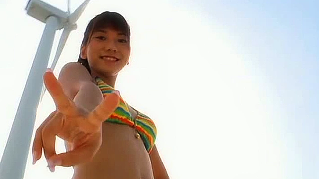 Aki Takajo loves to play by the ocean