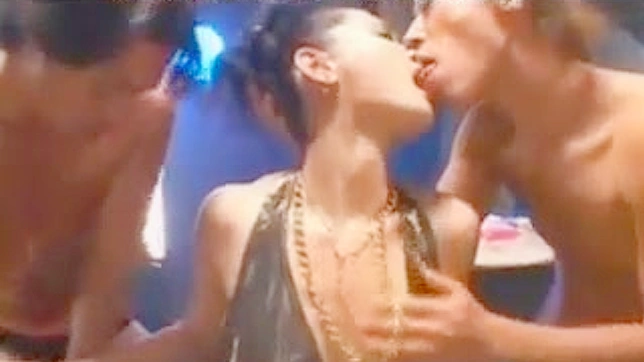 Two dudes kissing a hot JAV model on the center stage