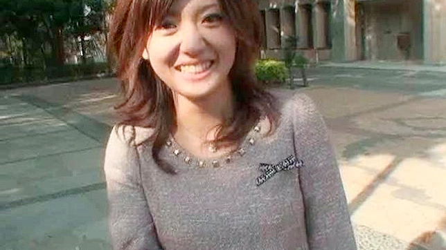 Beauty and sexy asian solo girl is eating outdoors