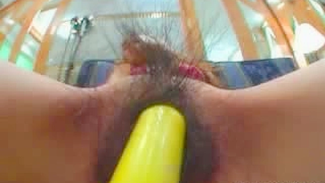 Kinky  stuffs her Asian pussy with food and toys